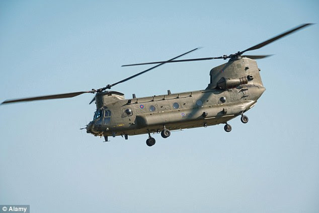 SAS SNIPER UNITS SCRAMBLED IN CHINOOKS: The heavily equipped troops are flown deep into IS territory aboard RAF transport helicopters, their quad bikes stowed on board, before touching down 50 miles from their target