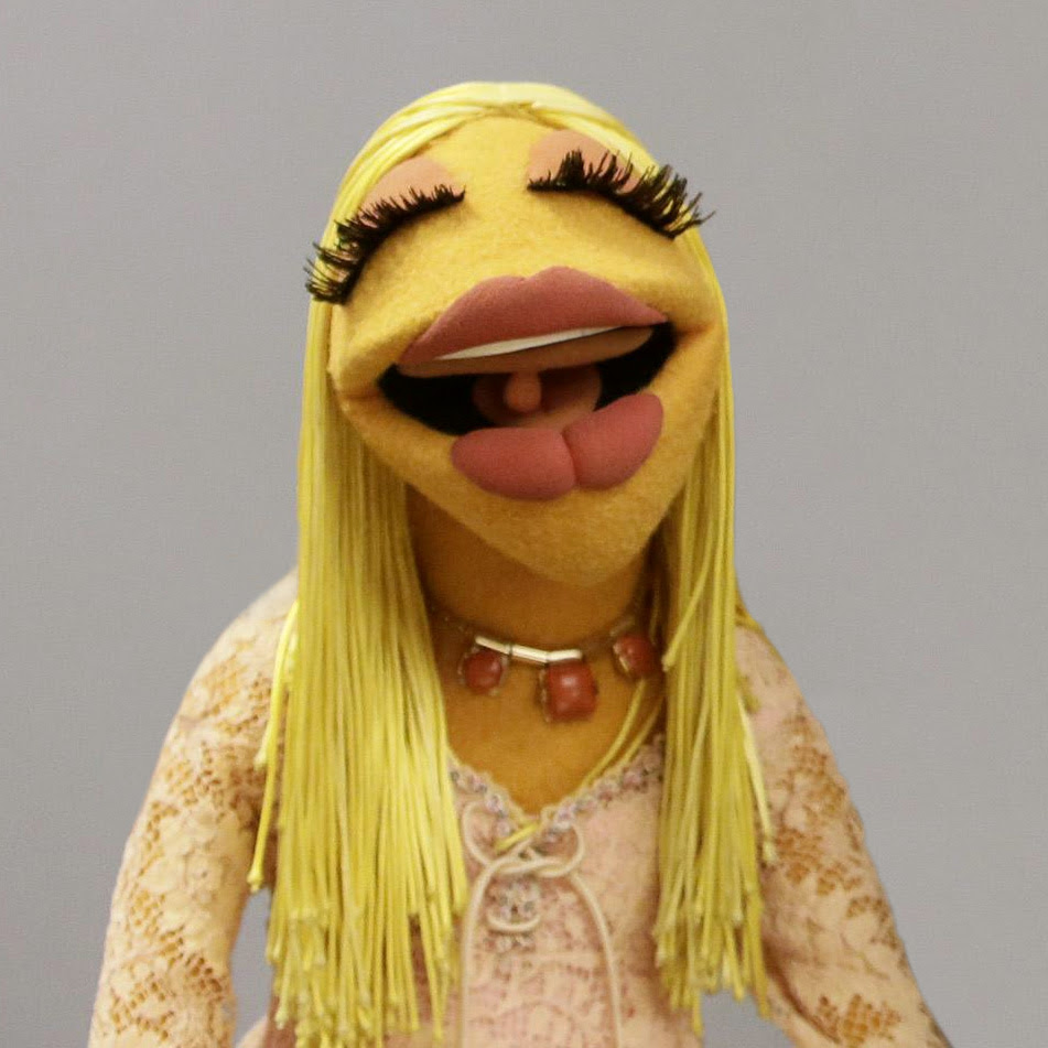 Long Blonde Hair Highlights Hairstyles Muppet With Big Lips And