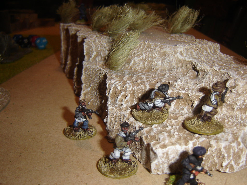 Taliban patrol in wadi prepares to assault British right flank