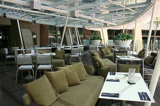 7atenine outdoor dining lounge at Esplanade Mall