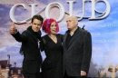Directors Wachowski and Tykwer pose on red carpet for the premiere of "Cloud Atlas" in Berlin
