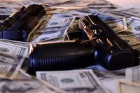 Guns and money