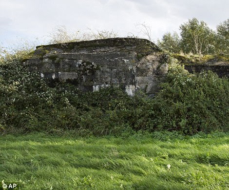 A bunker is covered in overgrowth in Fromelles, France