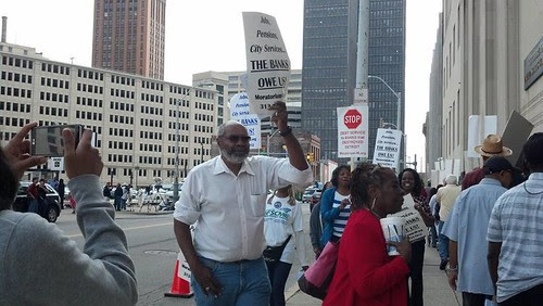 Abayomi Azikiwe, editor of the Pan-African News Wire, outside the federal courthouse in Detroit during the second session of the bank-imposed bankruptcy on the nation's largest African American municipality. This hearing took place on August 2, 2013. by Pan-African News Wire File Photos