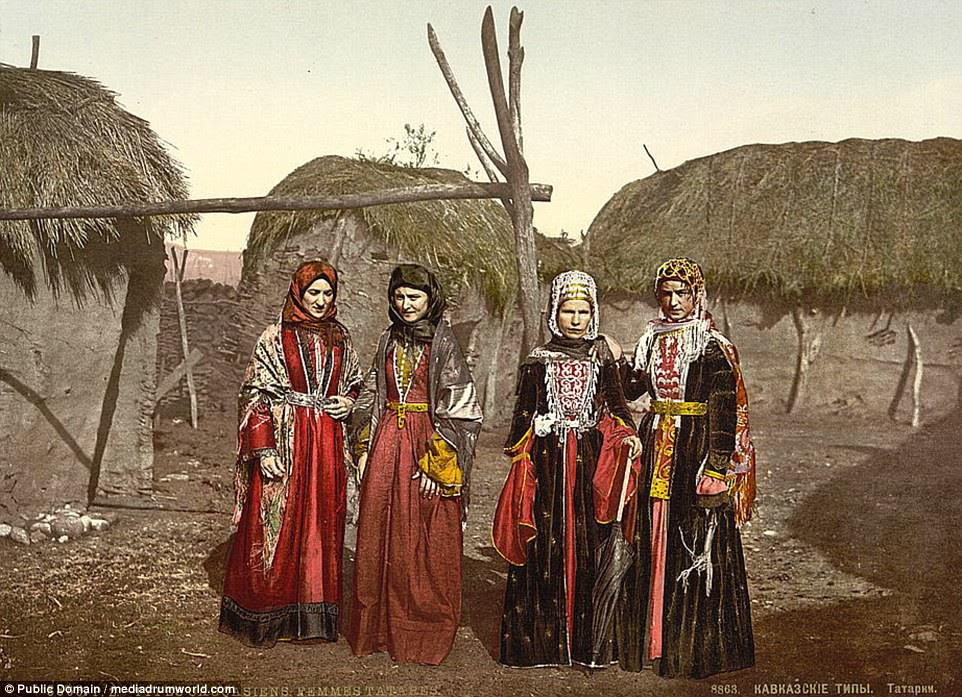 A group of colourfully-dressed women are pictured in the mountainous Caucasus region, on the border between Europe and Asia, in the revealing set of pictures showing what life was like in Tsarist Russia. The elaborate loose-fitting dresses are generally made from materials such as satin, silk, or brocade. Similar outfits are still worn at festivals in the current day, as the diverse nationalities and cultures celebrate their traditions