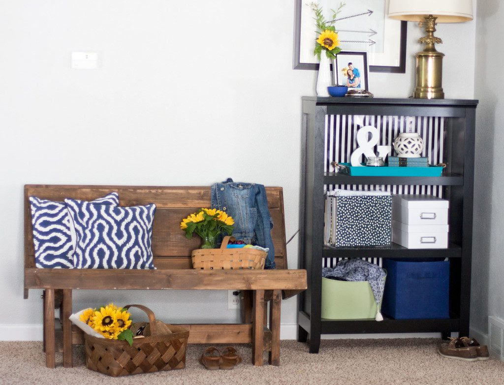 This summer bench and bookshelf look cute and organized. Love this white and blue home tour!