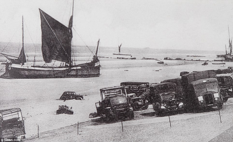 Some of the abandoned vehicles on the beach at Dunkirk appear to have been there so long they have sunken into the sand