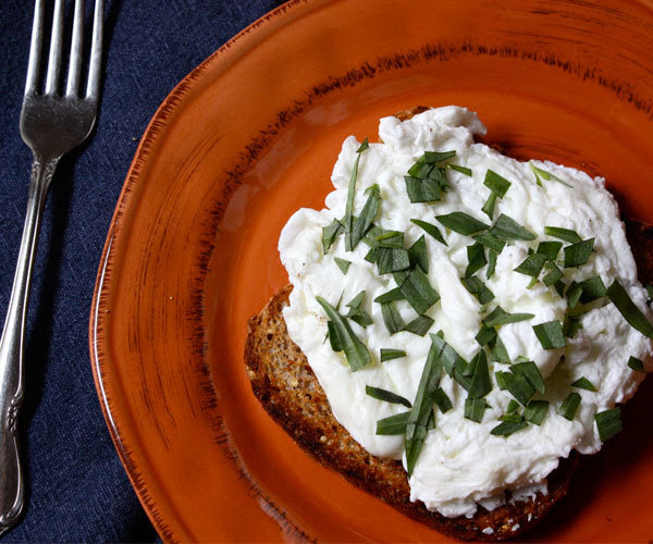 Herbed Poached egg whites on sprouted grain toast breakfast recipe.