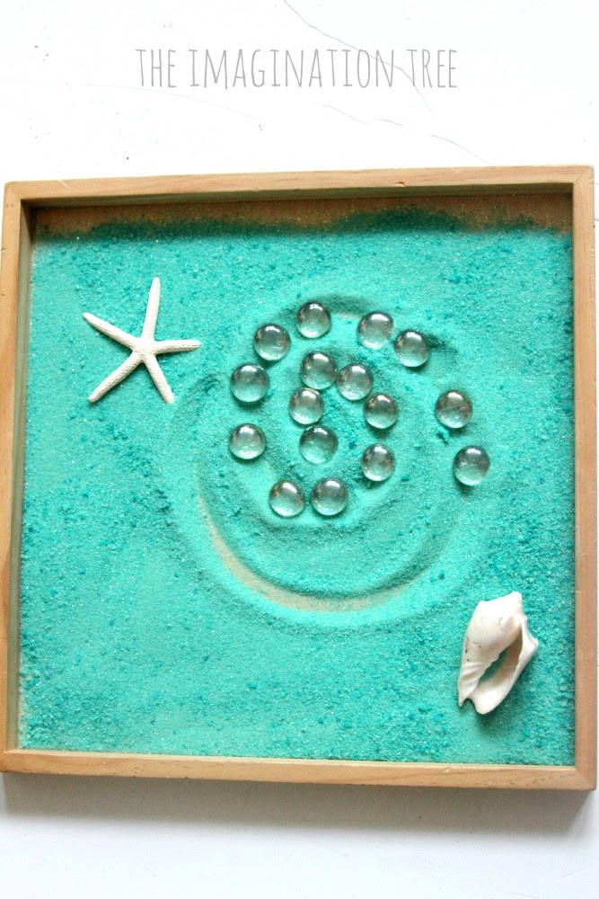Making patterns in an ocean sensory tray