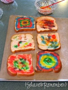 Painted bread (milk and food coloring) then toasted!