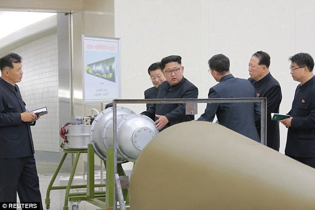 The hydrogen bomb's power is adjustable and can be detonated at high altitudes (Kim pictured in photos released Sunday)