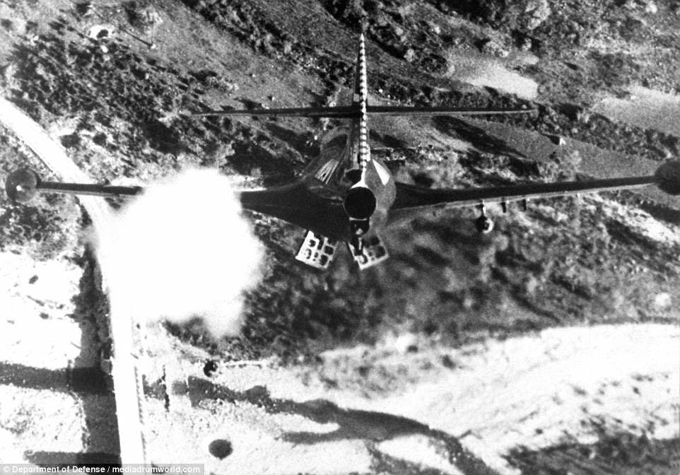 The Korean War became one of attrition and the frontline was close to the 38th parallel, the dividing line between the two countries. Lt R. P. Yeatman, from the USS Bon Homme Richard, is shown rocketing and bombing Korean bridge in November 1952