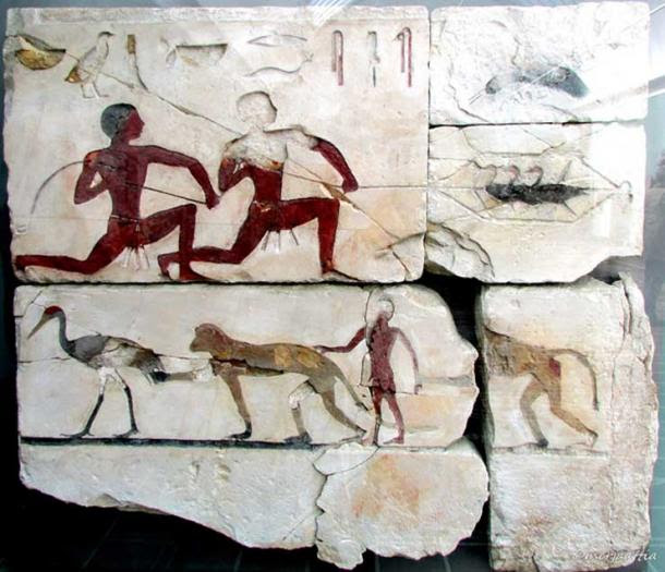 Two men are depicted catching                  birds, while in the lower register a boy is shown                  playing with two monkeys. Tomb of Atet, Meidum.                  Limestone with inlays. 4th Dynasty. Glyptotek,                  Copenhagen.