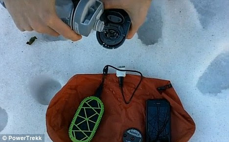 Still water: These images from a demonstration video show a snow-bound user pouring water into the container