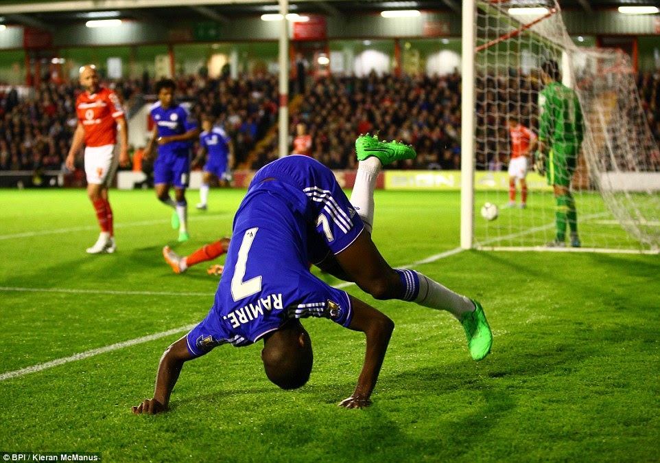 Ramires wheels away and does a somersault in celebration after claiming his first goal for the Blues since April