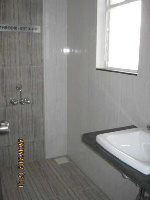 Toilet in the sample flat - Visit Gagan Akanksha, 1 BHK 1.5 BHK & 2 BHK Flats near Prayagdham, at Koregaon Mul, Uruli Kanchan, off Pune Solapur Highway, Pune 412202