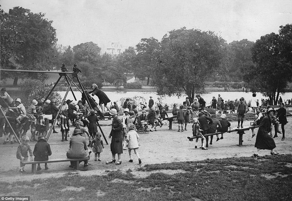 School children play in Hyde Park on a sunny day in 1935.