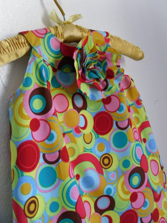 Baby Wears Concentric Circles by KidsInTheNest