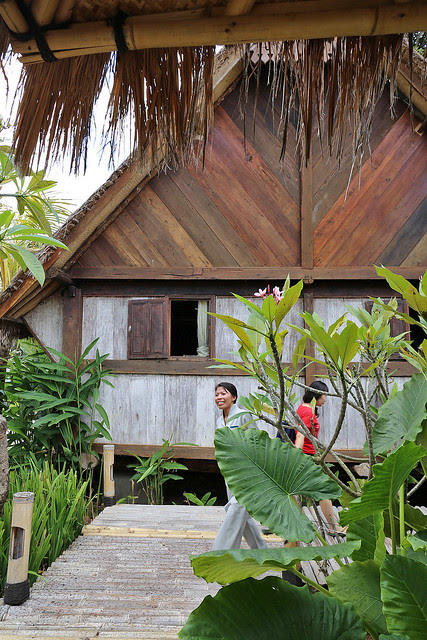 The spa features antique huts transplanted from Sumatra