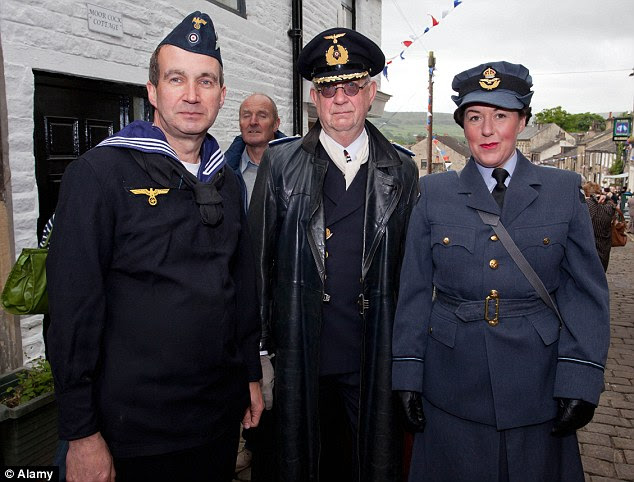 'Offensive': Other visitors wearing Second World War uniforms at last year's event in Haworth. The reaction by the 30-strong German delegation this year has led organisers to ban the wearing of Nazi outfits at future events