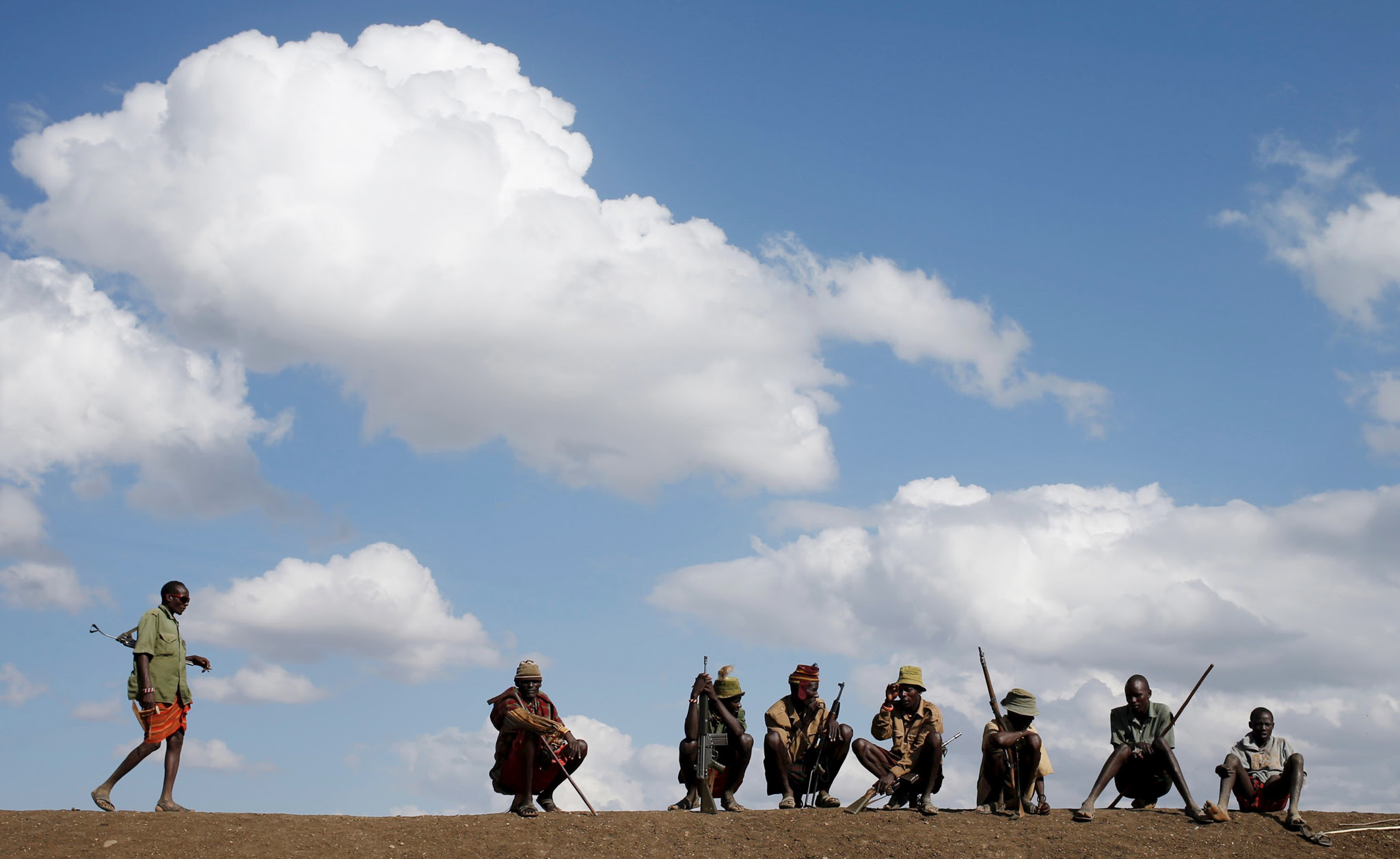 Turkana: life and livestock...Turkana men herd cattle, sheep and goats, protecting their livestock from rivals in the dry Turkana region in the north of Kenya. The men are armed with clean, well-maintained rifles because of frequent feuding with other tribes. Livestock are at the centre of Turkana life. REUTERS/Goran Tomasevic Matching text KENYA-TURKANA/ TPX IMAGES OF THE DAY TEMPLATE OUT. SEARCH "GORAN TURKANA" FOR THIS STORY. SEARCH "THE WIDER IMAGE" FOR ALL STORIES