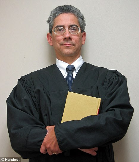 Not shielded: U.S. District Judge Marco Hernandez ruled Cox didn't qualify as part of the media, and therefore didn't get protection under the Shield Law