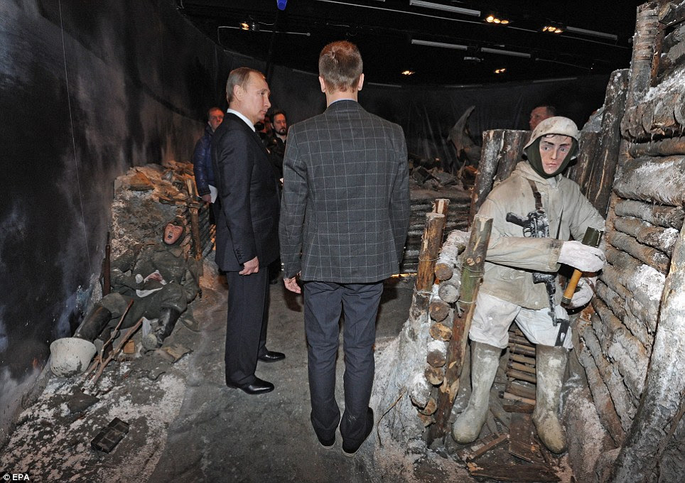 Russian President Vladimir Putin pictured at the 'Breakthrough of the Siege of Leningrad' exhibition in St Petersburg
