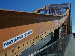 troubled bridge over water