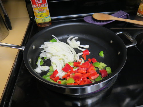 onions and peppers in