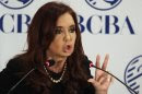 FILE - In this Aug. 2, 2012 file photo, Argentina's President Cristina Fernandez speaks at an event marking the 158 anniversary of the stock exchange in Buenos Aires, Argentina. The South American country has until midnight Friday, March 29, 2013 to propose how it would satisfy a $1.4 billion judgment won by plaintiffs in U.S. courts who have insisted for a decade on getting full payment in cash, plus interest and penalties, on sovereign debt that the country hasn't paid since its world-record default in 2002. Fernandez's government is reportedly preparing a response that analysts say could lead the country into another catastrophic default. (AP Photo/Eduardo Di Baia, File)
