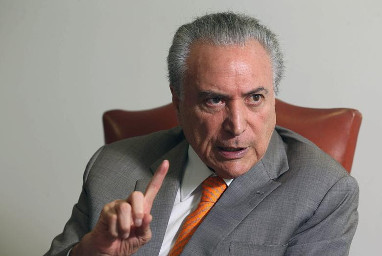 Brazil's President Michel Temer, gestures during an interview with Reuters at his office in Brasilia, Brazil, January 16, 2017. REUTERS/Adriano Machado