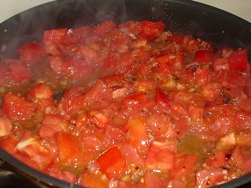 Garden tomatoes simmering