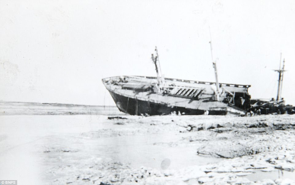The apocalyptic scenes will be portrayed in 'Dunkirk', which has been produced and directed by Christopher Nolan and will tell the story of Operation Dynamo from three perspectives of land, sea and air. Pictured, a shipwreck on the beach in La Panne