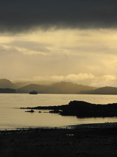 IFA ferry passes Kasaan during sunset in Kasaan Bay, Alaska