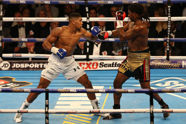anthony Joshua knocked out American Charles Martin in the second round to win world title in London