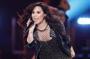 Recording artist Lovato performs "Give Your Heart a Break" during the VH1 Divas 2012 show in Los Angeles