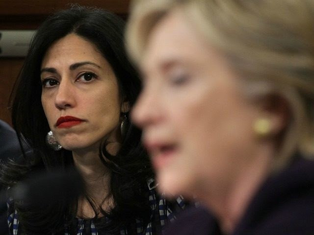 WASHINGTON, DC - OCTOBER 22: Long-time aide to Democratic presidential candidate and former Secretary of State Hillary Clinton, Huma Abedin (L), looks on as Clinton testifies before the House Select Committee on Benghazi October 22, 2015 on Capitol Hill in Washington, DC.