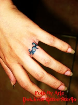 Ring Finger Tattoo