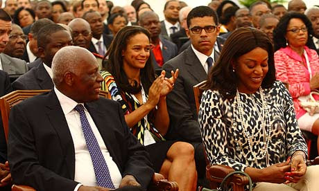 José Eduardo dos Santos, Angola's president, left, and daughter Isabel dos Santos in the second row