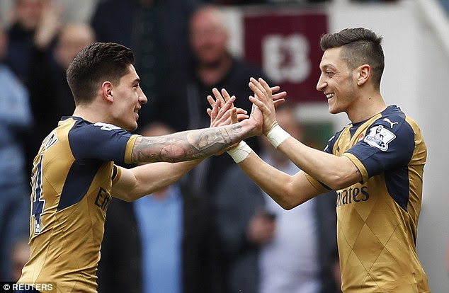 Image result for hector bellerin and mesut ozil