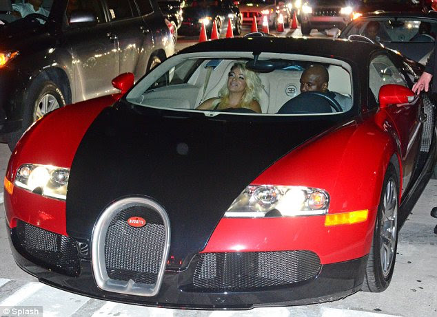 Flash: Floyd Mayweather Jnr, in his £1.8m Bugatti Veyron, leaves the NBA Basketball Finals game in Miami