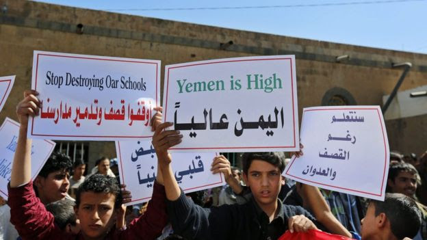 Young Yemenis hold placards during a protest against ongoing Saudi-led coalition military operations in the country, in front of the Russian embassy in Sana'a, Yemen, 03 December 2015.
