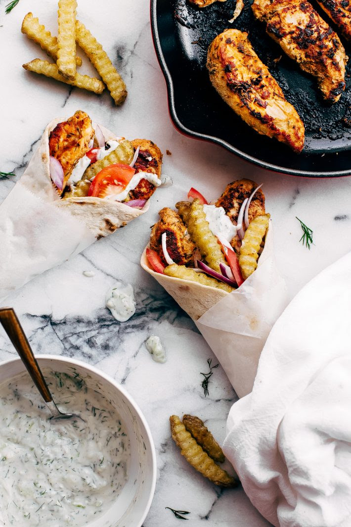 Easy Chicken Gyros with French Fries and Tzatziki Sauce - Learn how to make the easiest chicken gyros! Perfect for weeknight dinners! #chickengyros #gyros #gyrosrecipe #greekchicken | Littlespicejar.com