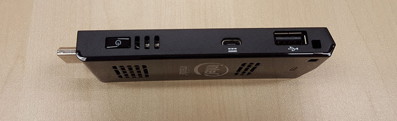 The Compute Stick has a power button, microUSB charging port, and USB 2.0 port on its other side.