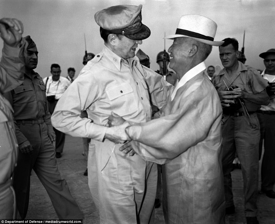Army General Douglas MacArthur, Supreme Commander for Allied Powers, (left) and Dr Syngman Rhee, South Korea's first President, warmly greet one another upon the General's arrival at Kimpo Air Force Base, at the invitation of President Rhee in 1948. The General and Mrs MacArthur made the initial trip to Korea, to view an auspicious occasion which spelled freedom and independence for the first time in over forty years