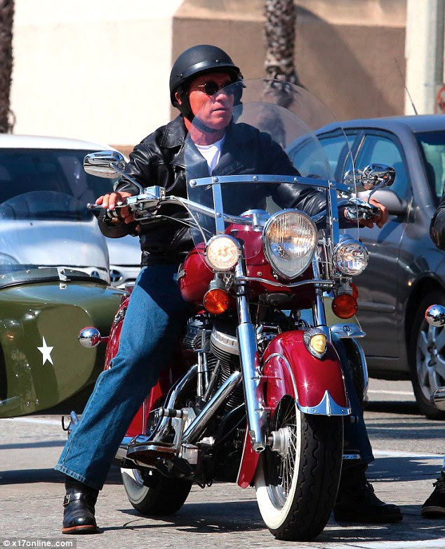 Waiting his turn! The actor stops in the middle of Santa Monica traffic as he waits for the green light