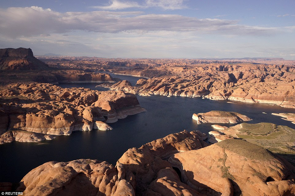 Changes: Previous water levels are marked on the unmistakable rocks that form part of Lake Powell on the Colorado River
