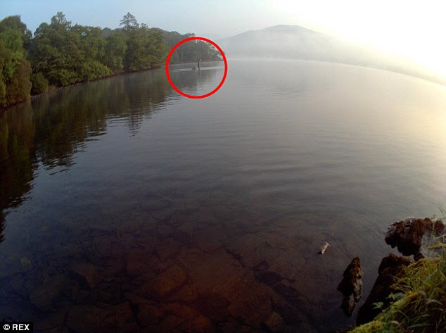 The photo is said to have been taken by a man who left his camera at the side of the lake to automatically capture images throughout the day