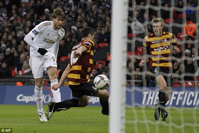 Lethal: Michu doubled Swansea's lead with a deadly accurate strike into the far corner