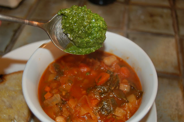 Minestrone soup with a dollop of fresh basil pesto